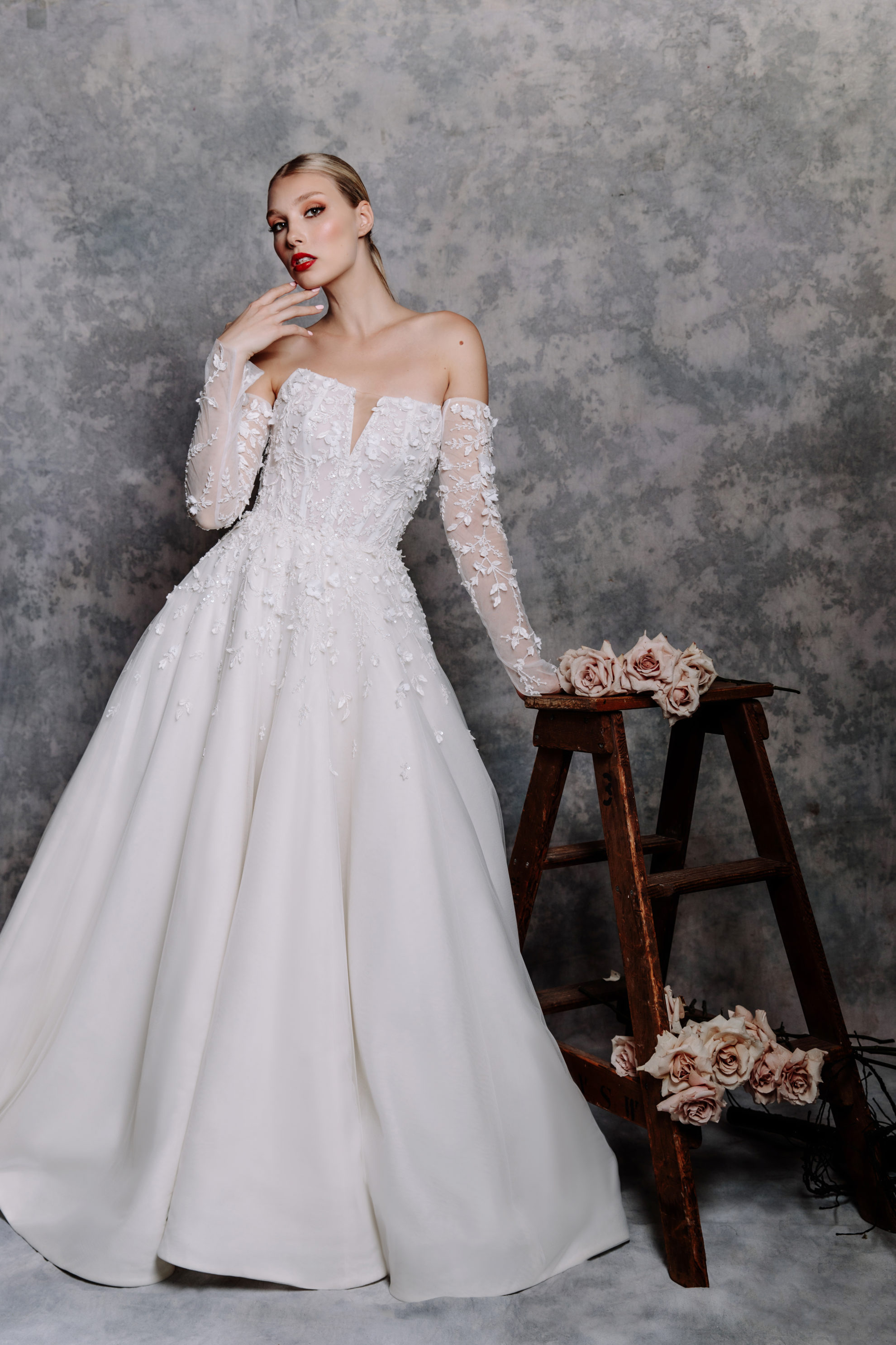White off-shoulder wedding gown