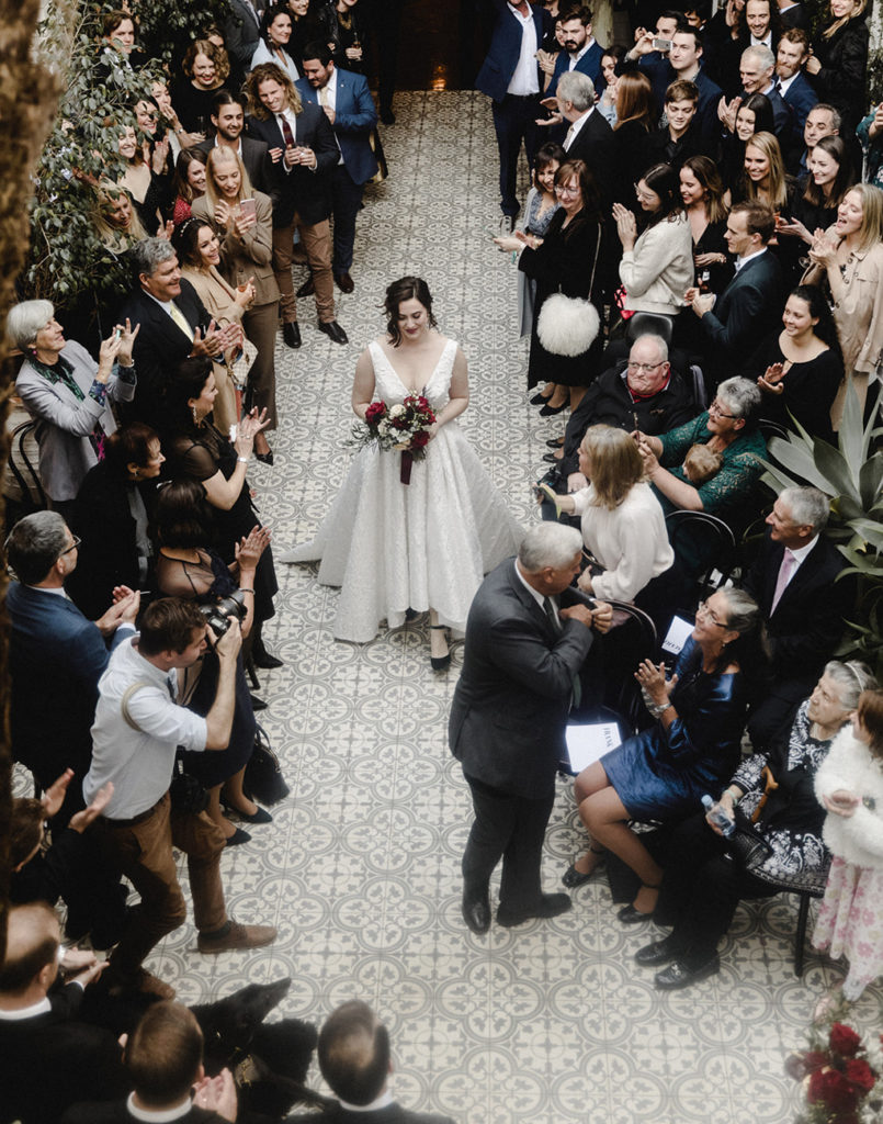 Guipurean Bride Walking Down Aisle