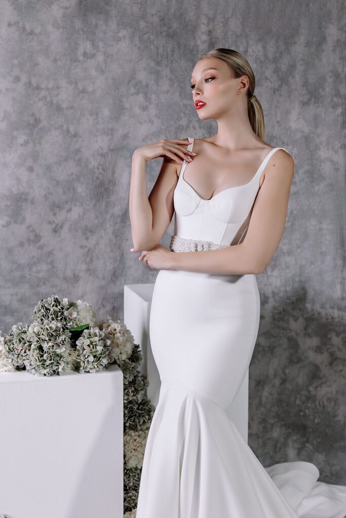 Stylish girl with white hera gown