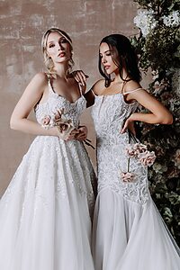 two beautiful gorgeous girl with white sleeve less celene gown