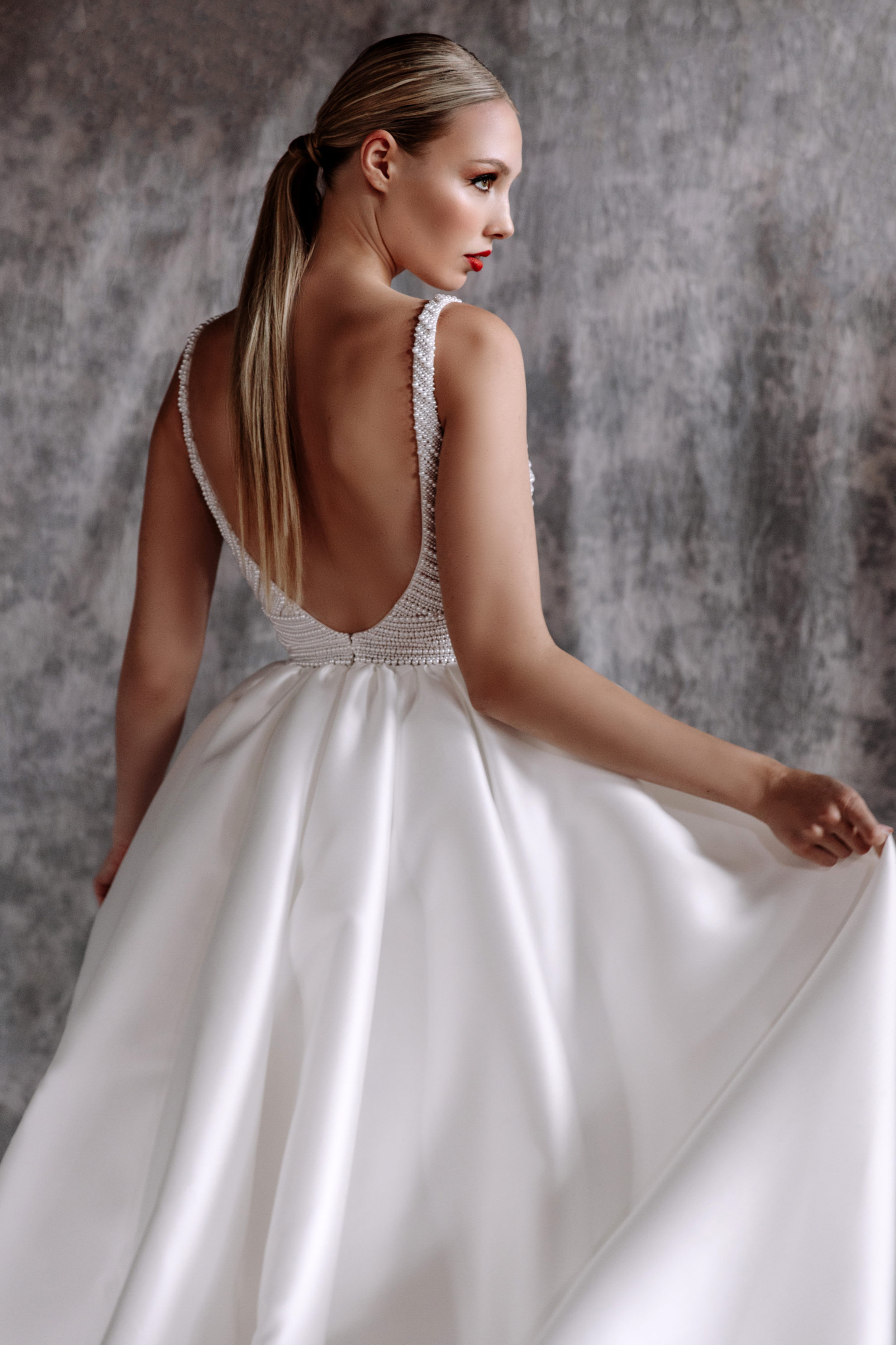 beautiful girls give back pose white backless white antoinette gown